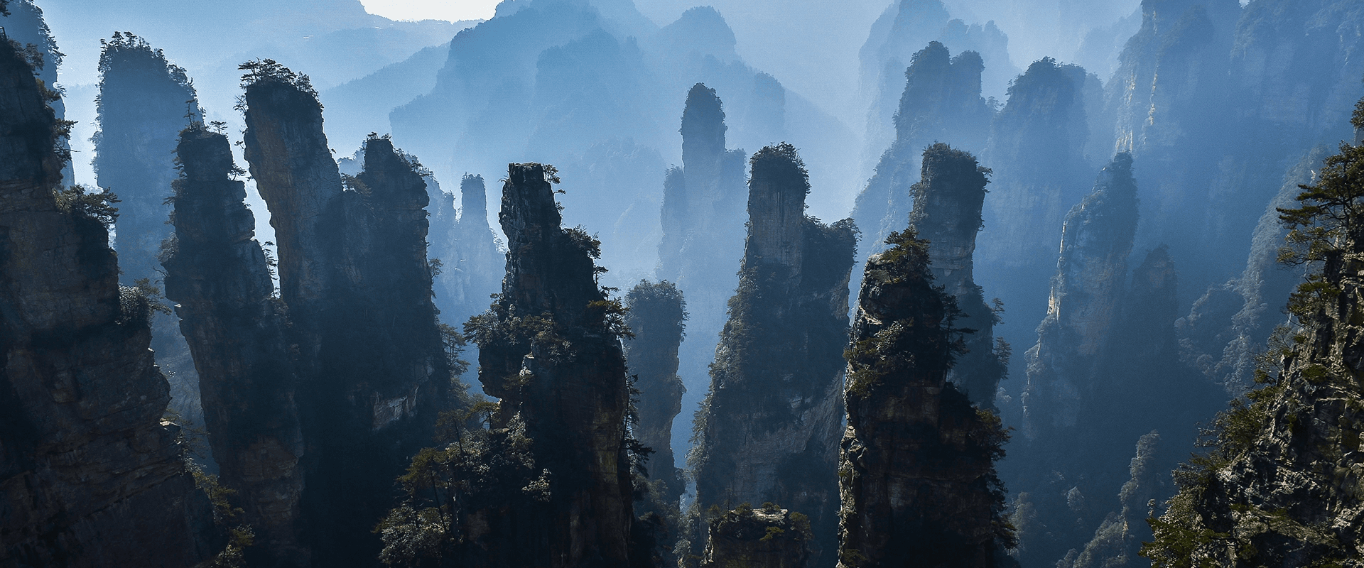 Zhangjiajie sandstone pillars and alpine mist for China nature travel