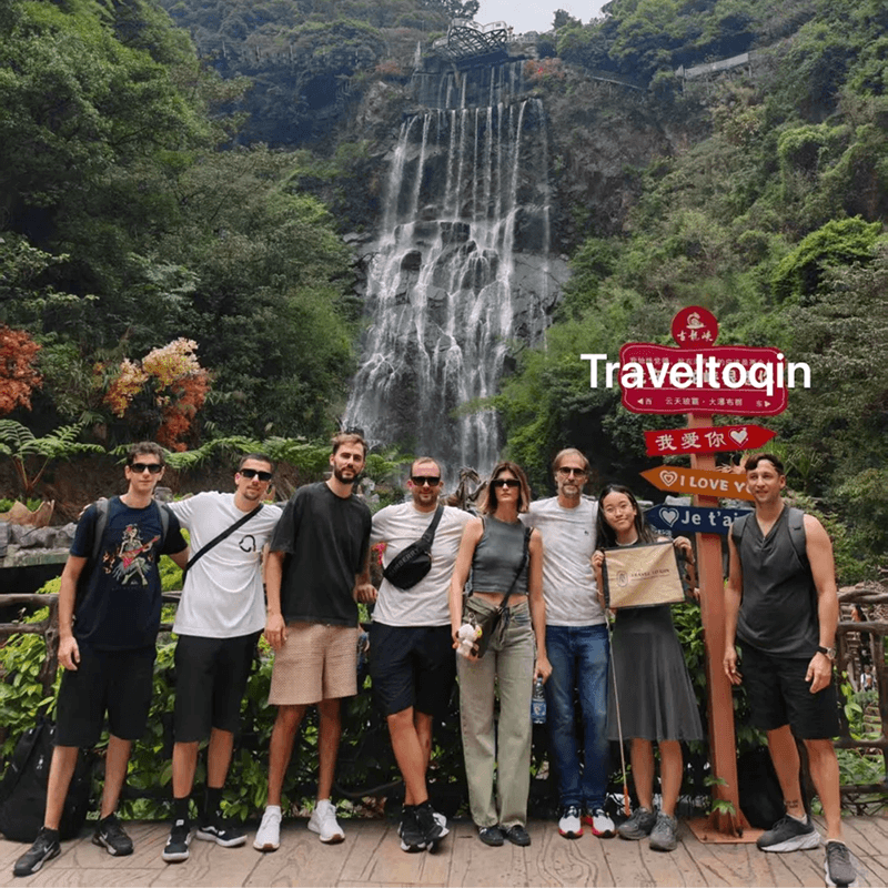 Local TravelToQin guide at a China landmark