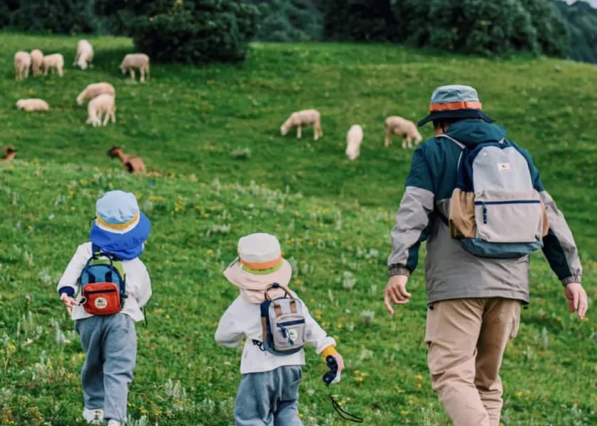 Family journey across a grassland