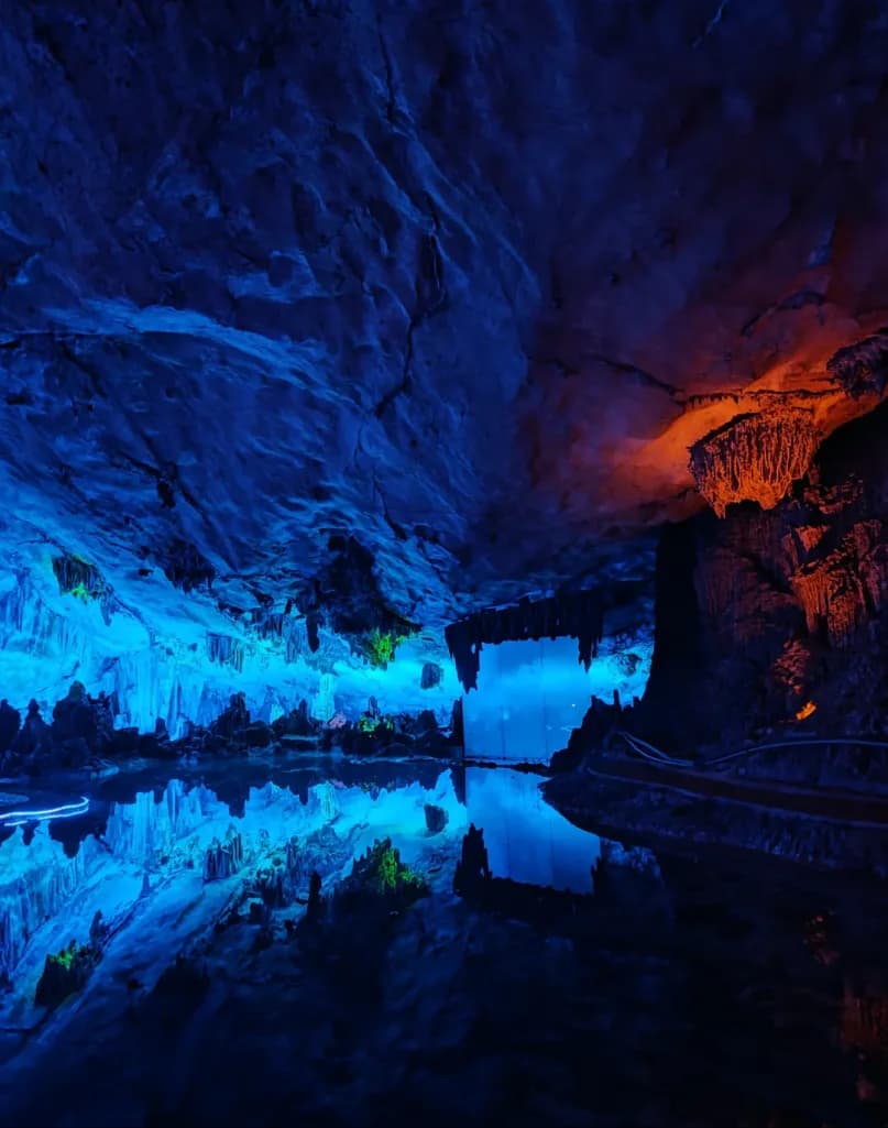 Day 2 — Silver Cave · Yulong River Bamboo Rafting · West Street