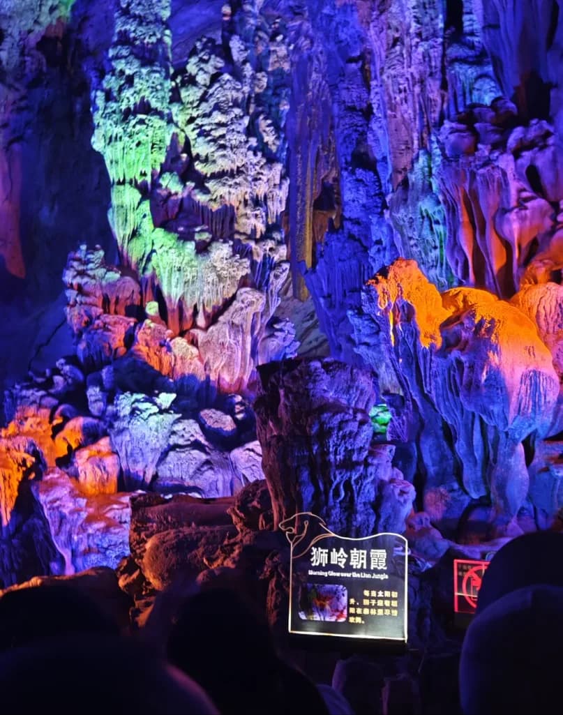 Day 2 — Silver Cave · Yulong River Bamboo Rafting · West Street