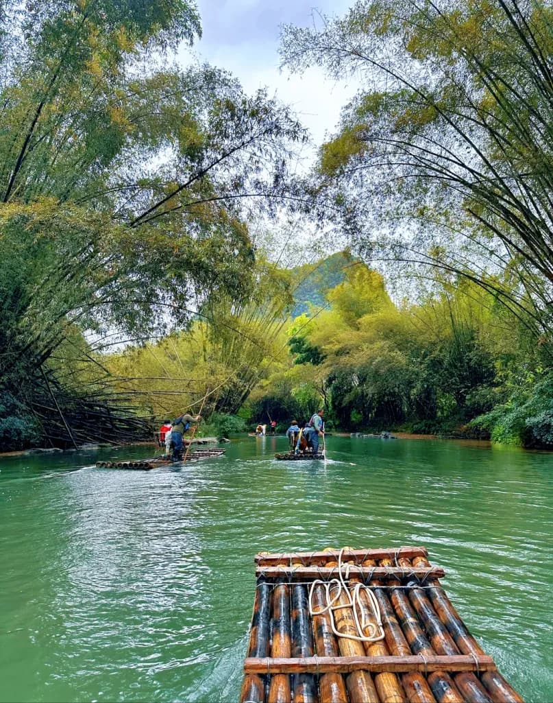 Day 2 — Silver Cave · Yulong River Bamboo Rafting · West Street
