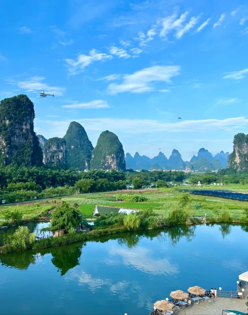 Day 4 — Li River Boat Ride · Ten Mile Gallery Cycling · Yangshuo Helicopter Tour
