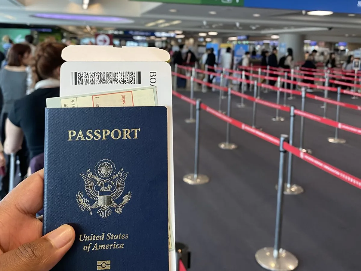 Passport and boarding pass before an international connection