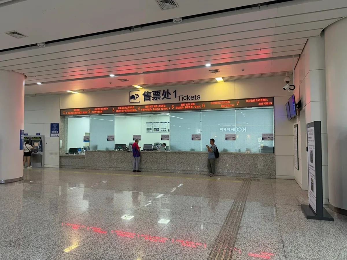 Manual ticket counter at a China high-speed railway station